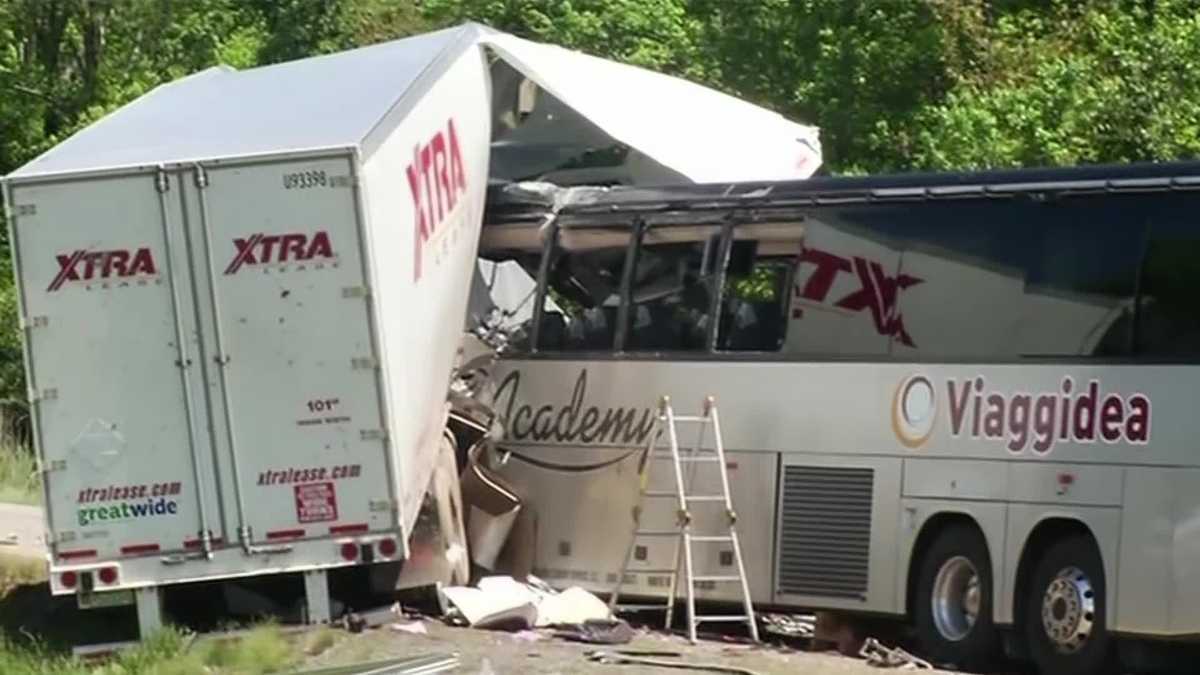 Uncut: Tractor-trailer crashes head-on with tour bus