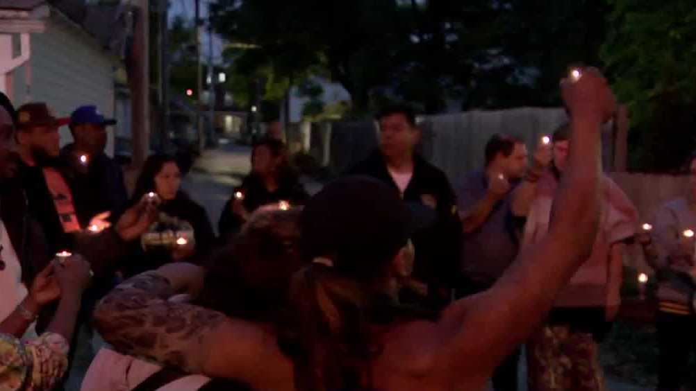 Family, friends hold vigil for woman run over in alley by police