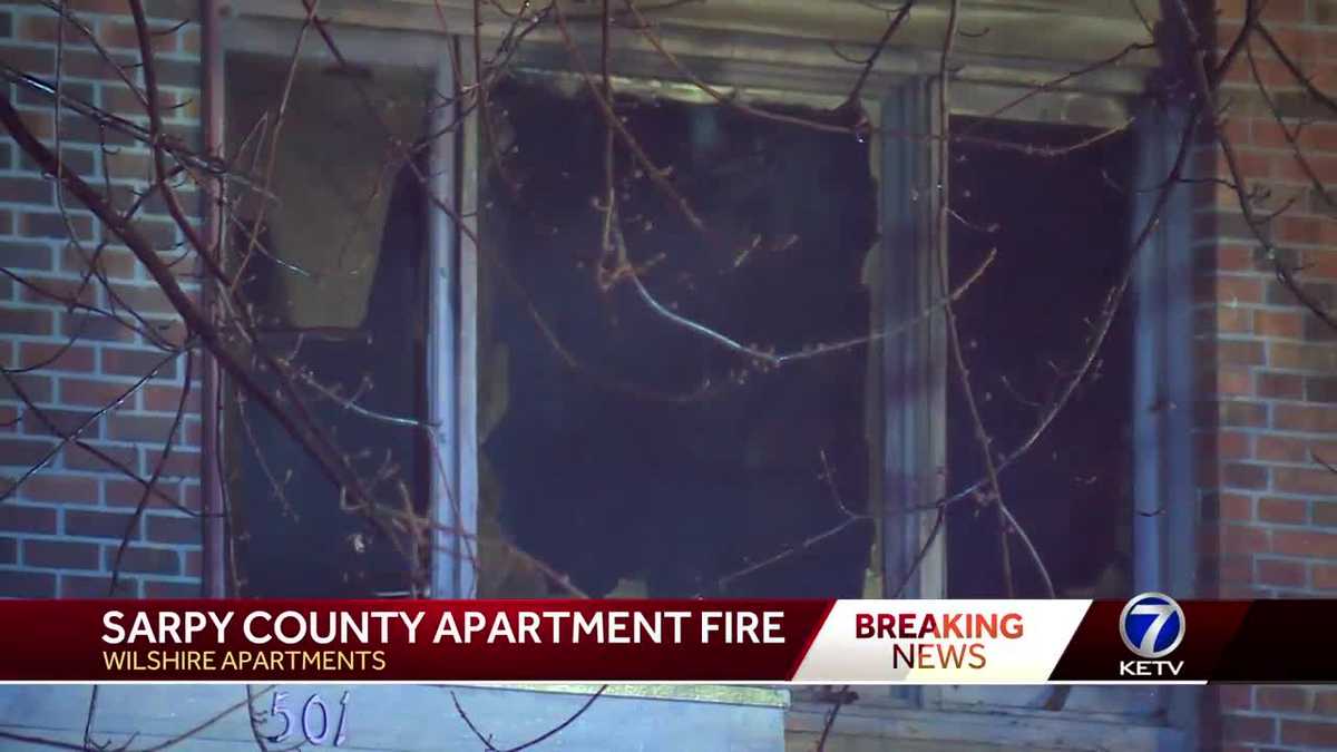 Firefighters rescue two people trapped during apartment fire
