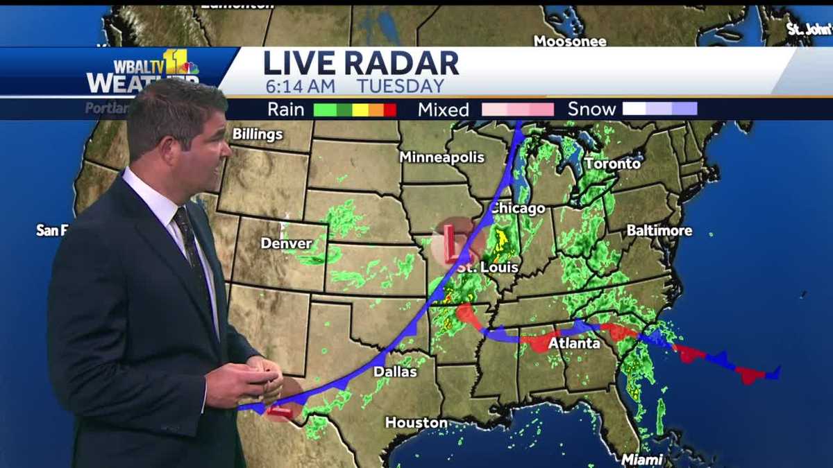 Mostly cloudy, chance of stray showers Tuesday