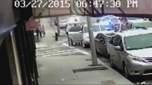 shows Boston police officer being shot