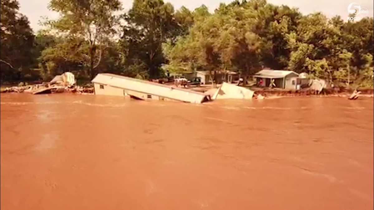 Drone video captures moment house falls into Cimarron River; more at risk