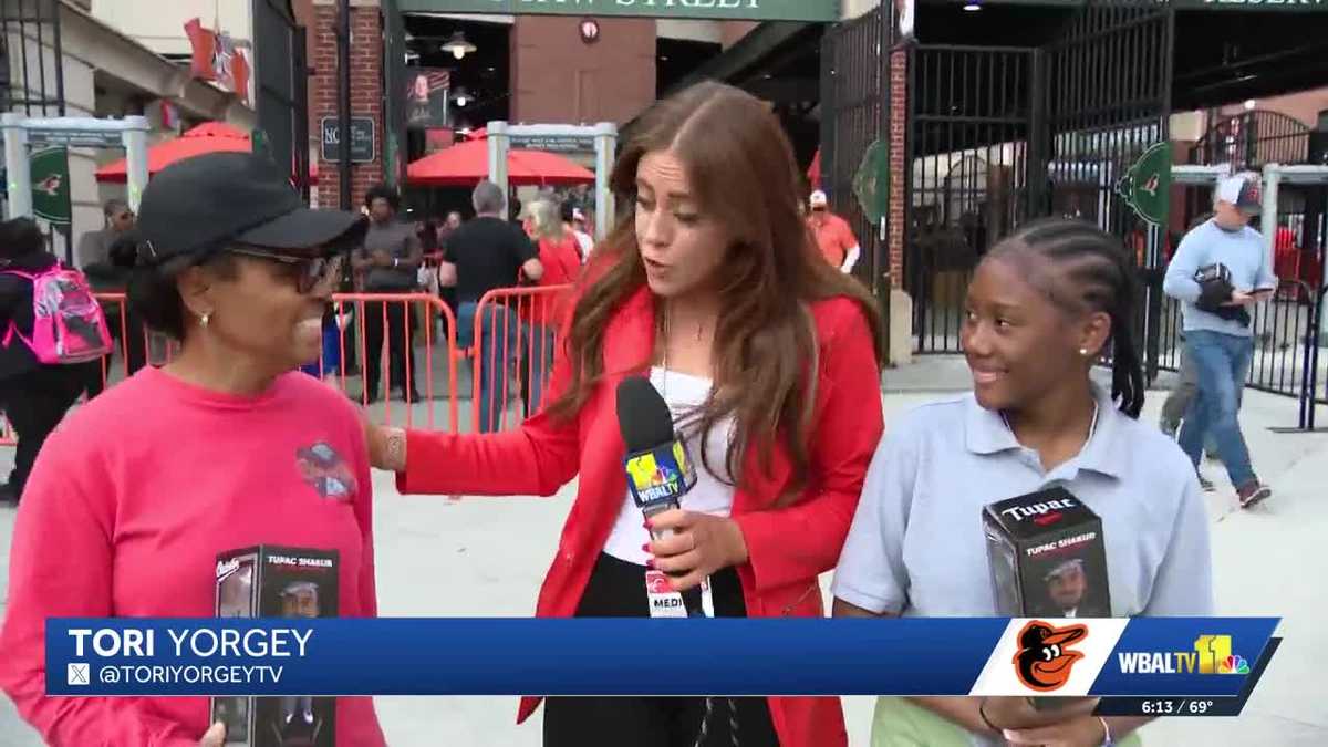 Fans line up for Tupac bobblehead at Orioles game