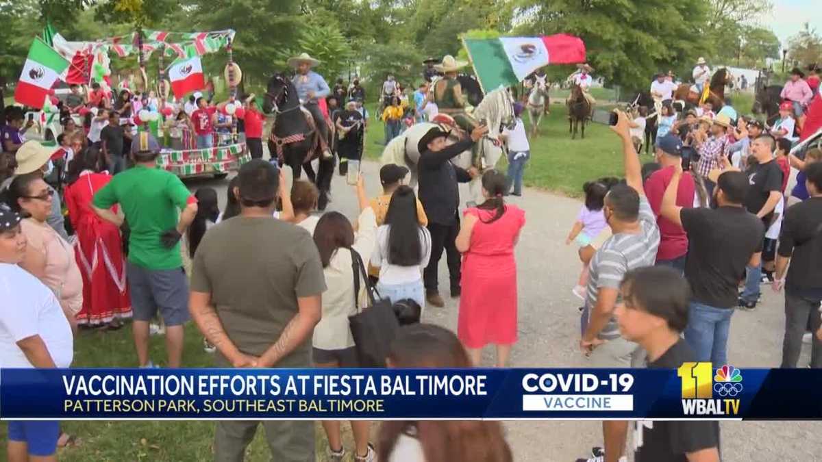 Officials work to vaccinate people at Fiesta Baltimore 2021