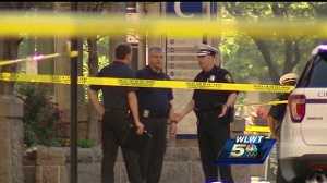 Officials say man fatally shot by police pulled knife on security guard