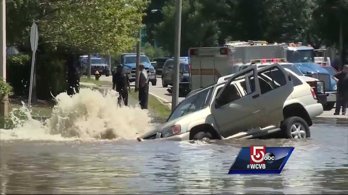 SUV slams into hydrant, causes flooding in Dorchester