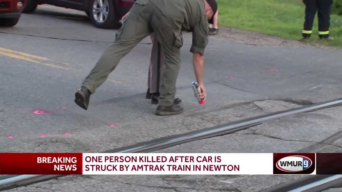 One person killed after car collides with train