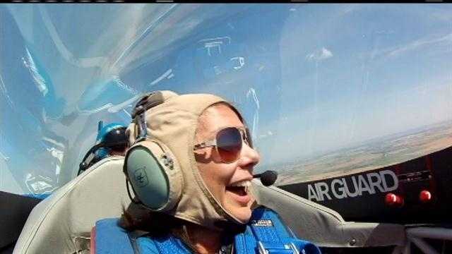 Reporter takes wild ride on aerobatic plane
