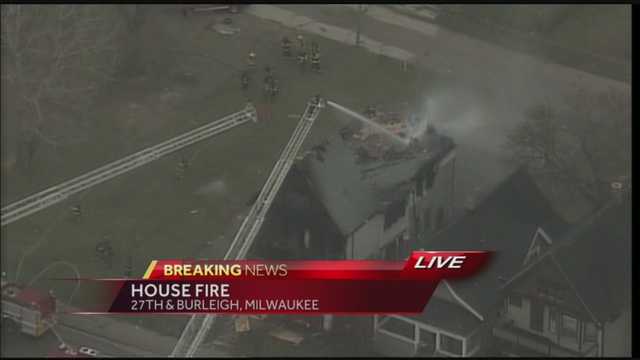 Crews battle house fire near 27th, Burleigh