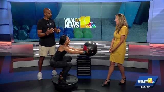 Practicing balance and building core strength on 11 Fitness