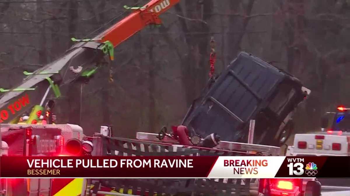 Vehicle pulled from flooded ravine in Bessemer