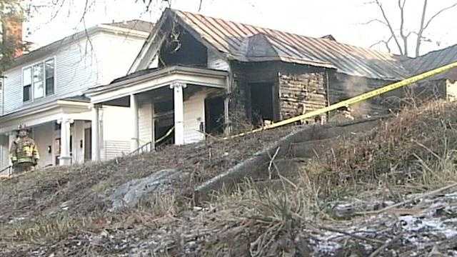 Police: Woman found in burning home was slain