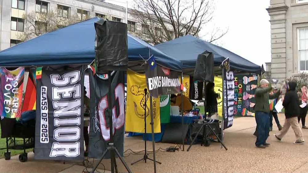 People gather at State House to voice opposition to school flag legislation