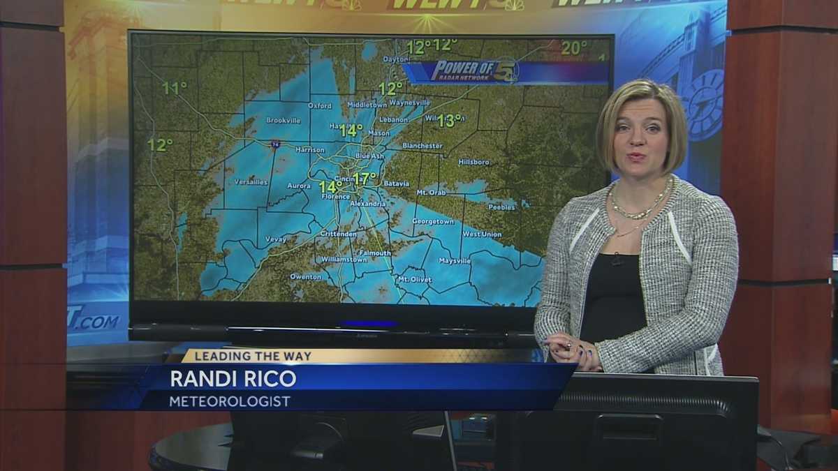 Snow moving out, cold moving in