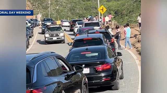 Memorial Day crowds jam Bixby Bridge, and a firefighter says a fire engine could not get through
