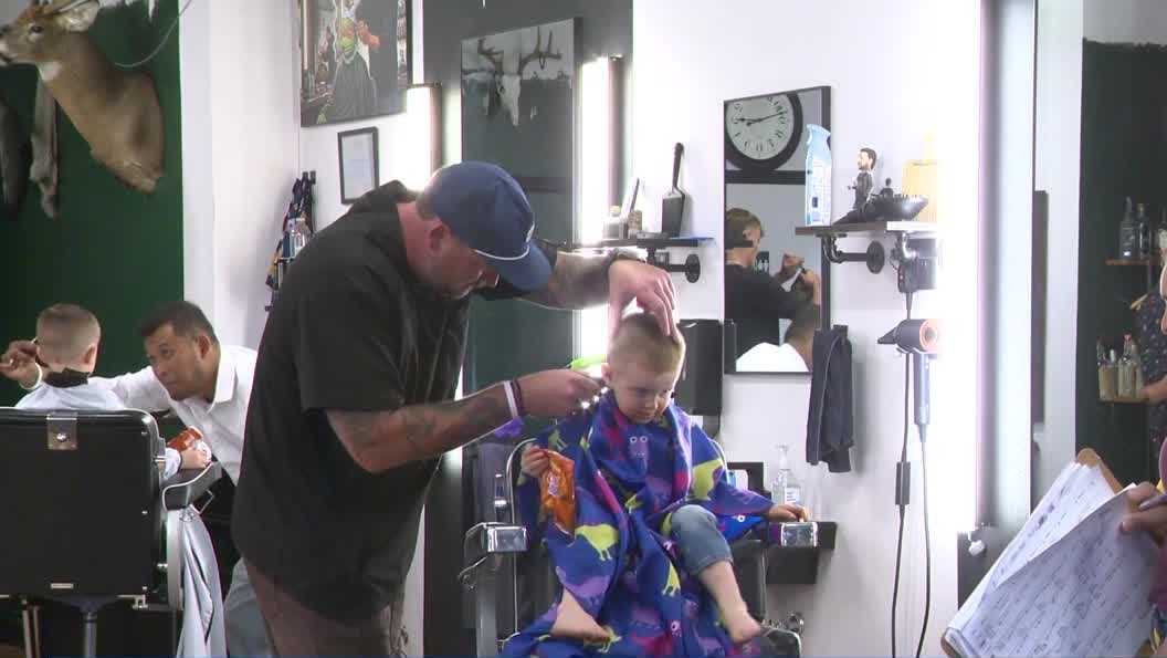 Grinnell barber gives more than 160 children free haircuts, school supplies