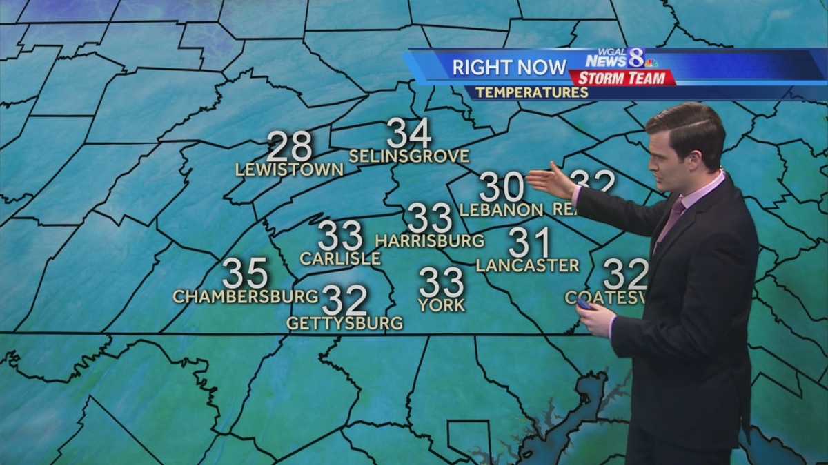 Mix of clouds and sunshine; snow showers Thursday