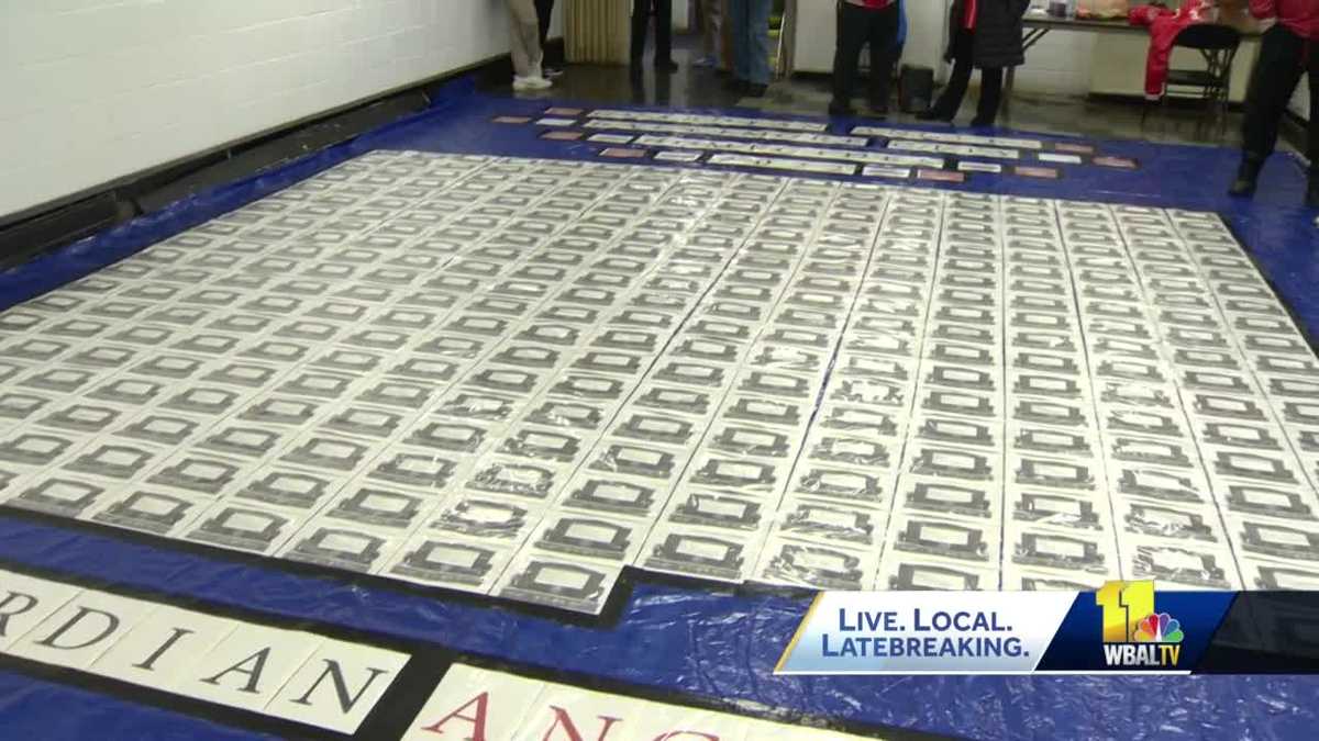 Banner honors 333 homicide victims in Baltimore City over 2022