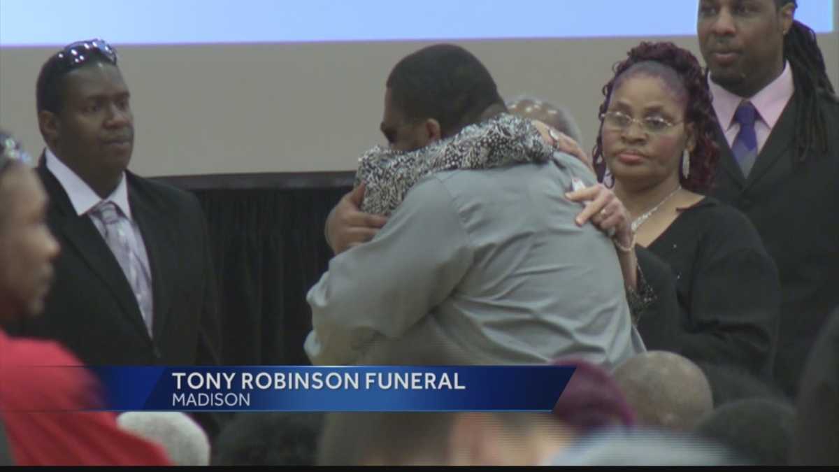 Big crowd turns out for Tony Robinson's funeral