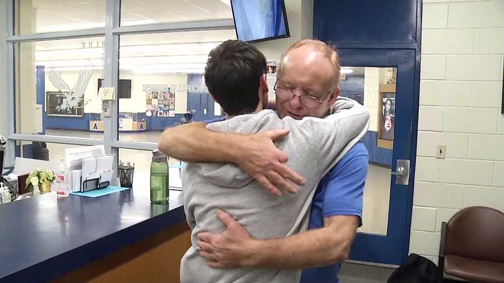 Student surprises Attleboro school janitor with Christmas gift