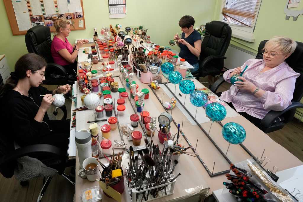 Polish 'magicians of glass' create Christmas baubles for clients worldwide