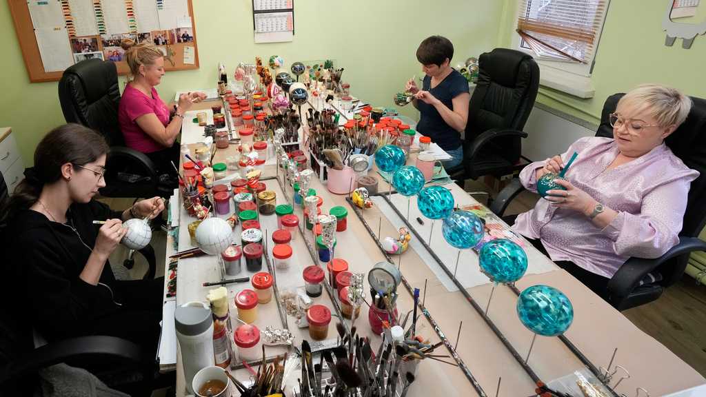 Polish 'magicians of glass' create Christmas baubles for clients worldwide