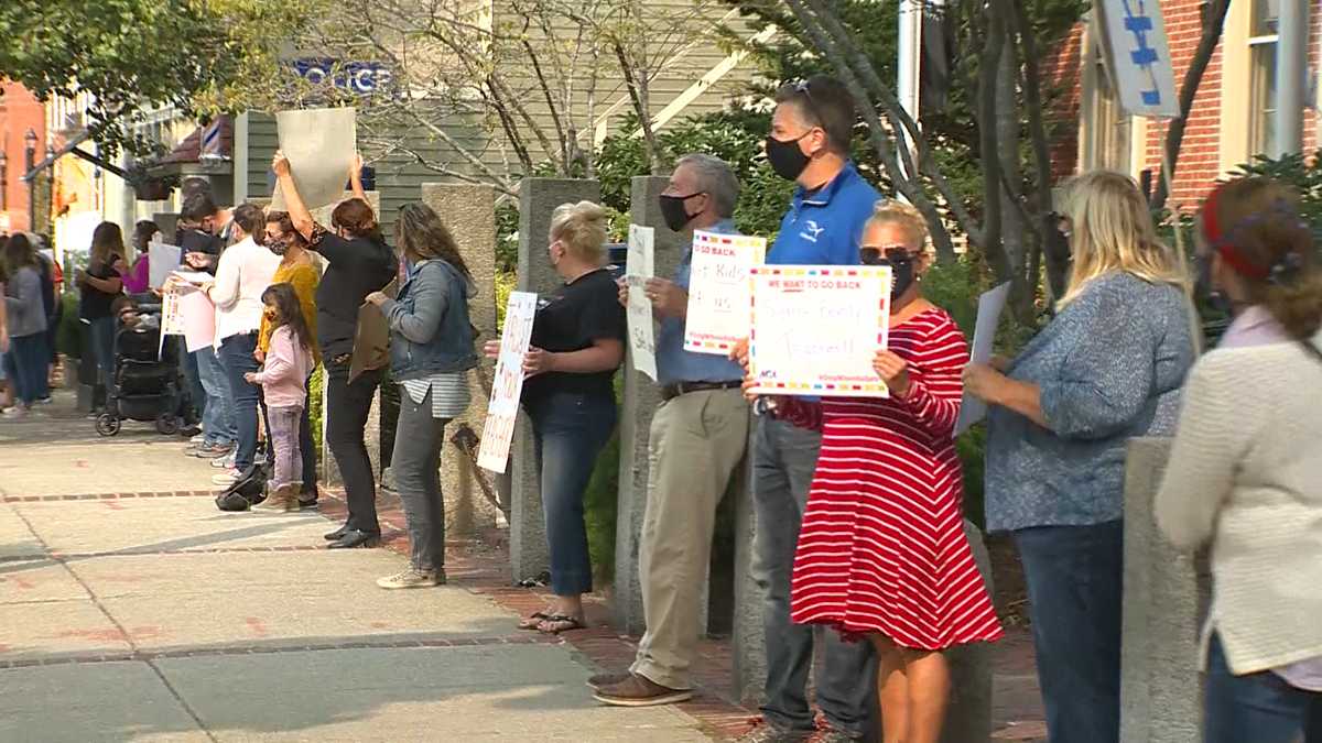 Beverly teachers rally in protest of school district's hybrid reopening ...