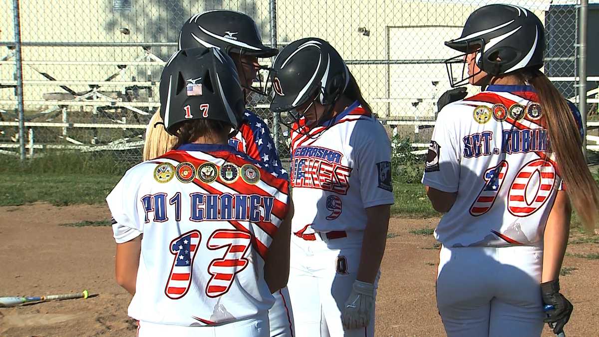 Softball team's uniforms get emotional response