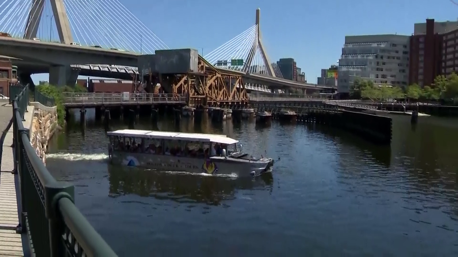 A Boston Duck Tours boat in the Charles River near the Zakim Bridge.