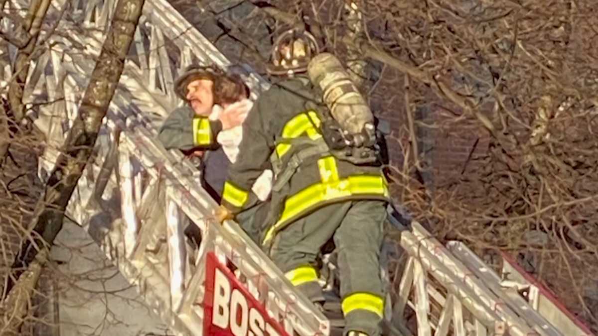 Boston firefighters rescue mother, 2 children from burning apartment ...