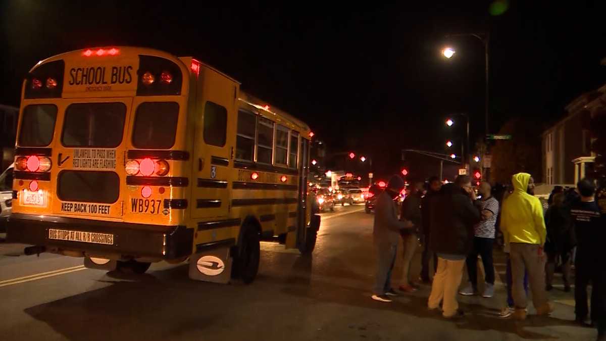 Boston standoff, shooting unfold as children return from school