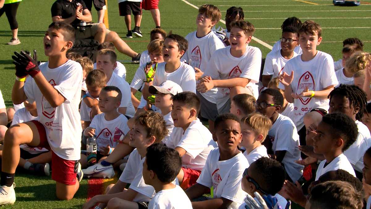 Louisville football players hold camp at King Louie's Sports Complex