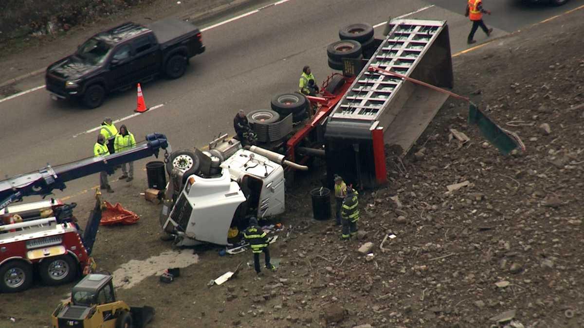 Dump truck rollover on interstate ramp in Canton causes big backup