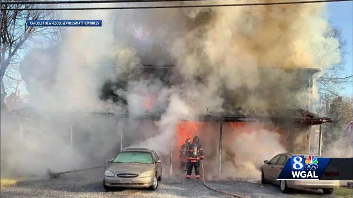 Two people injured in house fire in Carlisle
