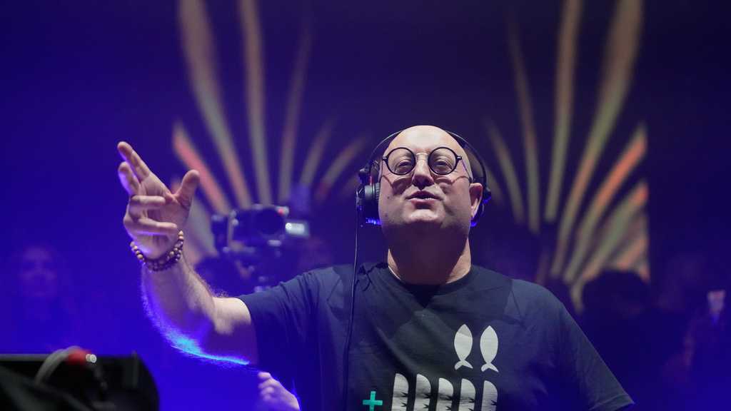 Priest by day, DJ by night: A padre's rave draws cheers and controversy