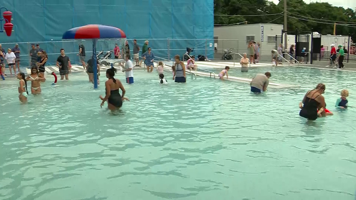 Charlestown pool reopens and WCVB reporter can't resist jumping in