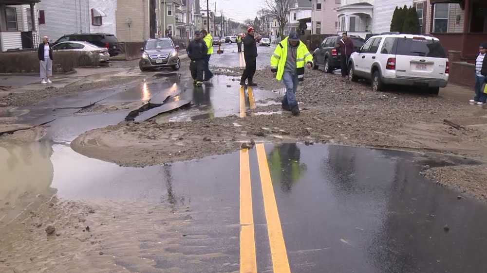 Water main break in Chelsea floods street, causes road to buckle