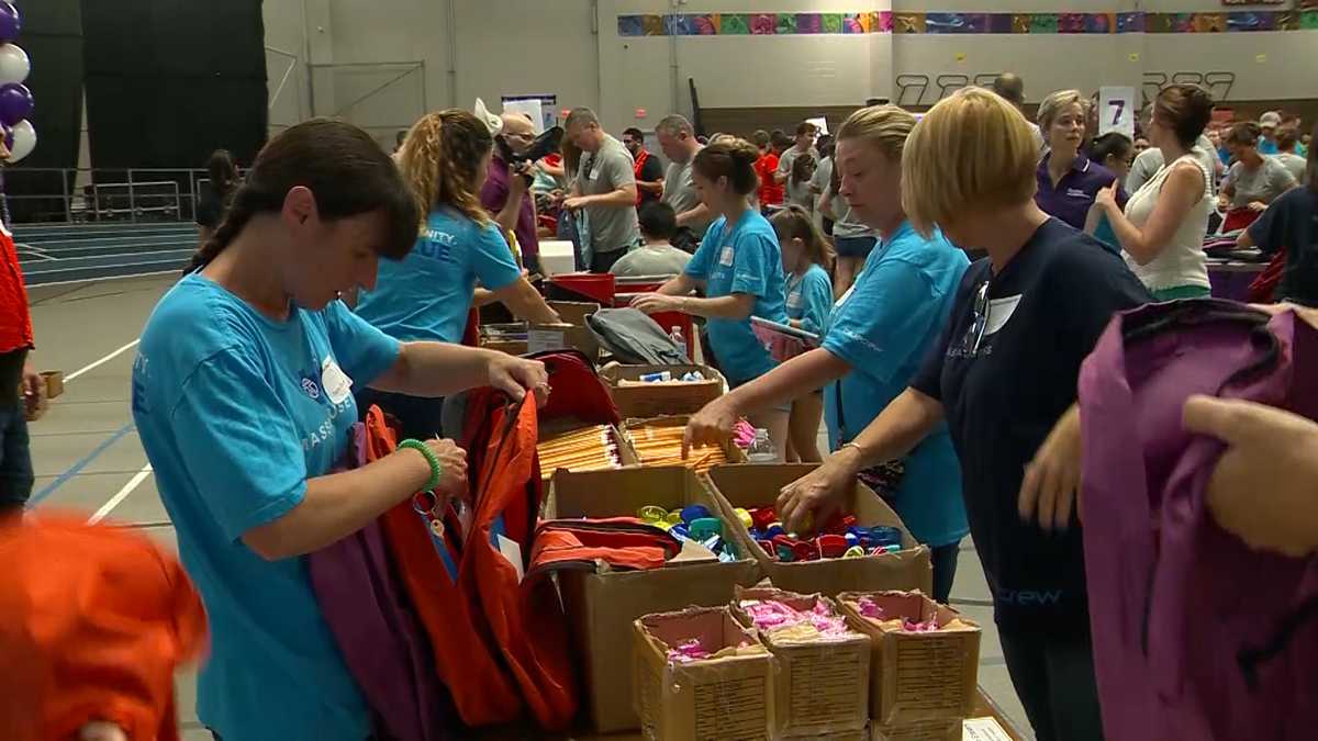Cradles to Crayons volunteers pack 40,000 backpacks for kids