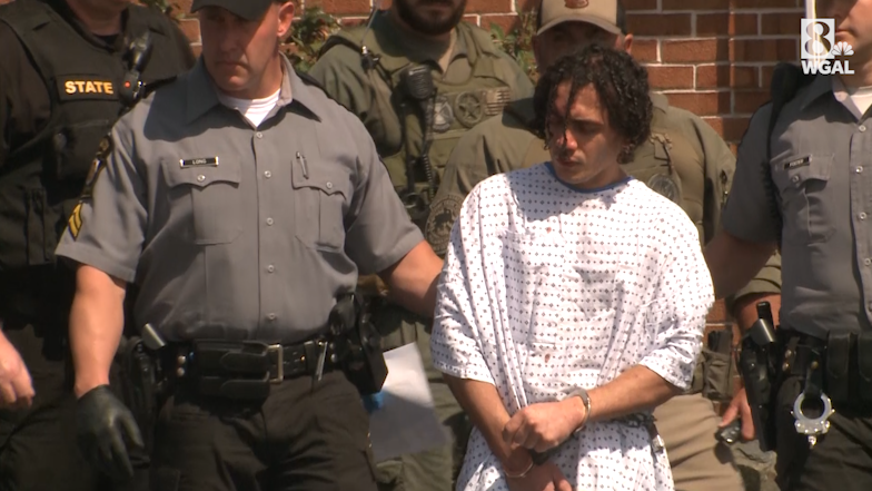 Heavily armed law enforcement officers move along Rt. 52 as the search  continues for Danilo Cavalcante in Pocopson Township, Pa., on Sunday, Sept.  3, 2023. Cavalcante escaped from the Chester County Prison.