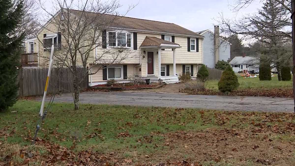 Residents of Mass. town concerned after dead woman found in neighbor's yard