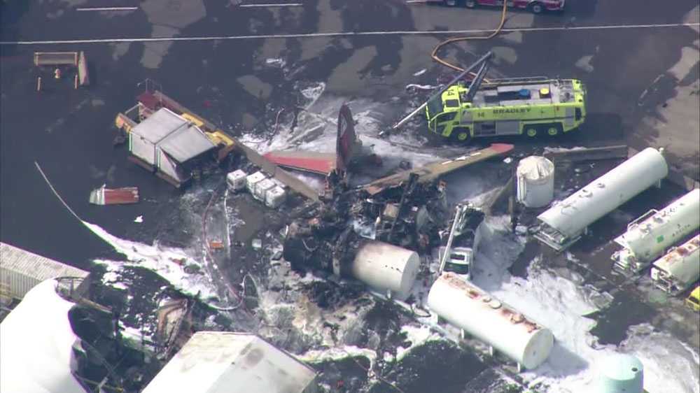 At least 7 killed in Conn. plane crash involving WWIIera bomber