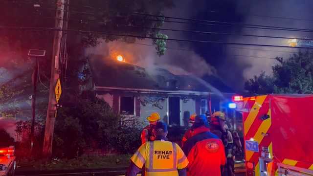 Woman dies after being rescued from burning Georgetown home