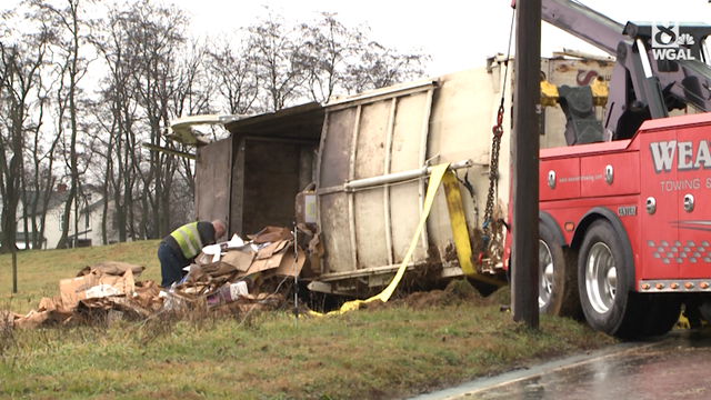Trash truck rolls over due to slick road - Vimarsana News