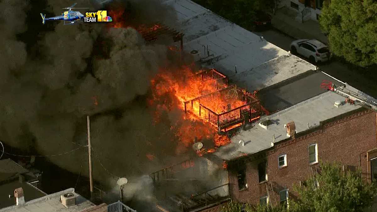 Rapidly spreading fire consumes rowhomes in Baltimore