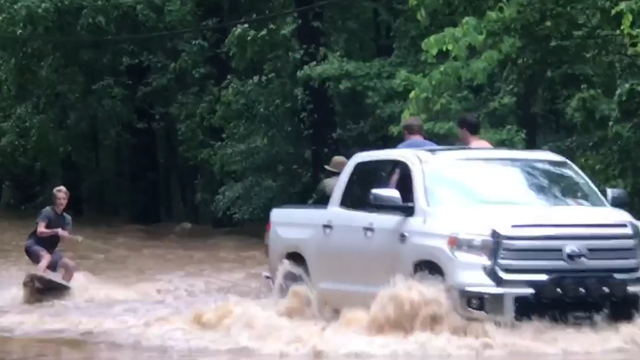 WATCH: Wakeboarding on flooded Mountain Brook Parkway - Vimarsana News