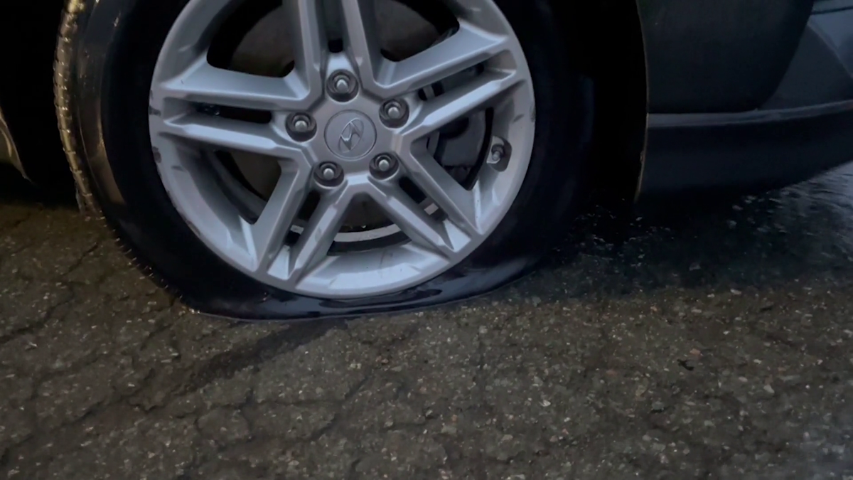 Massive pothole pops tires in Danvers
