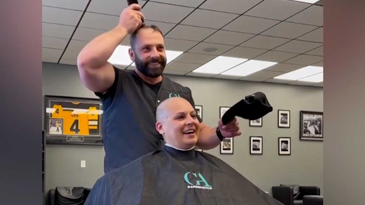 Massachusetts barber shaves own head to comfort cancer patient