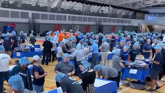 Volunteers pack meals for Greater Boston Food Bank on Sept. 11