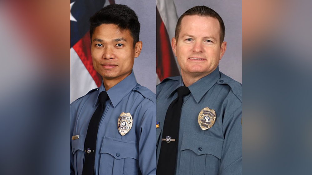 1 Georgia police officer killed, another injured in hotel shootout