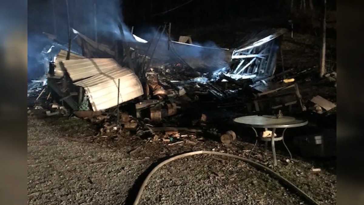 Woman charged after boy found dead in southeast Kentucky house fire